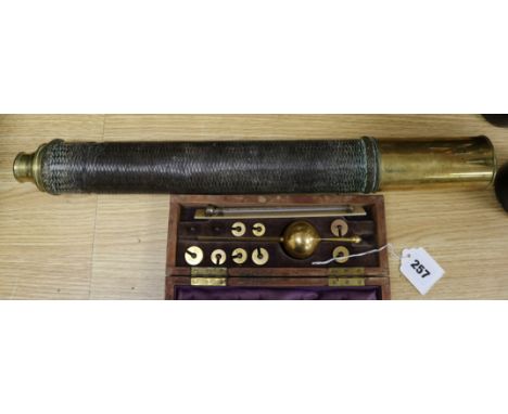 A Georgian brass telescope and a Sikes hydrometer