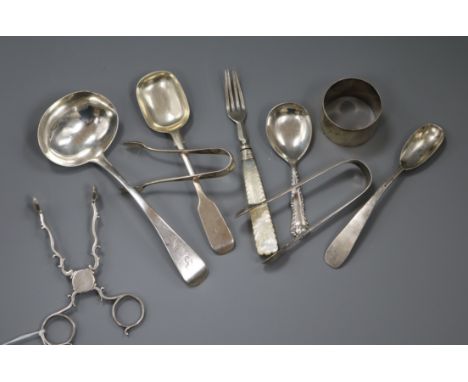 A pair of Georgian silver sugar nips and sundry small silver including sauce ladle, napkin ring, spoons etc.