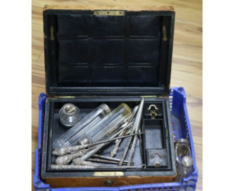 Fifteen assorted silver topped jars, ten assorted silver or white metal mounted button hooks or glove stretchers and an Aspre