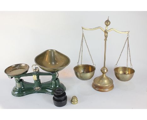 A set of Salter green enamel kitchen scales, seven weights and a set of balance scales