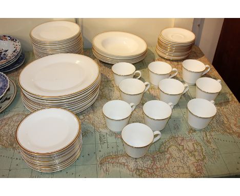 A Royal Doulton porcelain 'Gold Concord' pattern part tea and dinner service, white ground with gilt decoration, comprising f