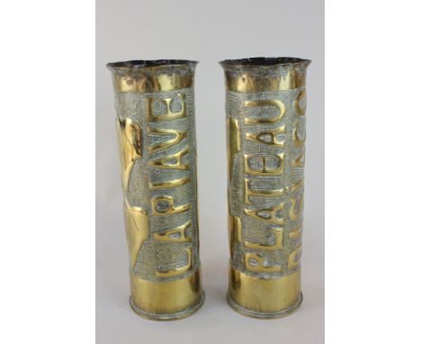 Two First World War brass shell casings, embossed with ivy leaves, one La Piave, the other Plateau Dasiago, both marked on ba