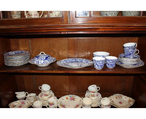 A Royal Crown Derby porcelain part breakfast set in the blue peacock pattern, comprising a muffin dish, an oval platter, four