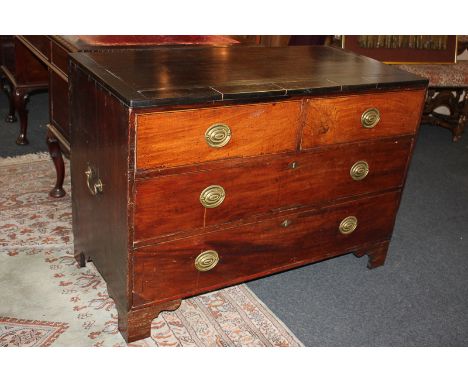 A campaign style mahogany chest of two short over two long drawers, with cross banded top, on bracket feet, 112.5cm, (a/f)