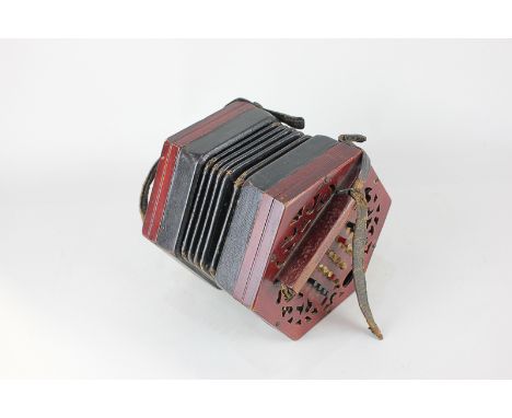 An accordion, in painted wood and black leather (a/f)