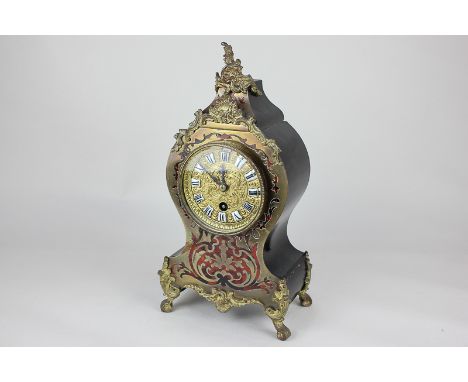 A French gilt metal mounted boule style mantel clock with 3 1/2 inch gilt dial (a/f), 30cm