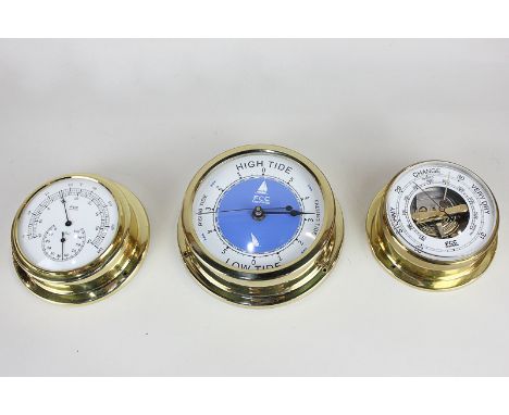 A set of three FCC Prevision bulkhead instruments including a tide clock, a barometer and a thermometer 