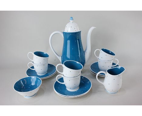 A mid 20th century Susie Cooper porcelain coffee set for six in blue and white spot design (one saucer a/f)