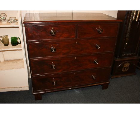 A Victorian mahogany chest of two short over three long drawers, on bracket feet 108.5cm wide
