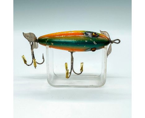 The lure shown is in a beautiful rainbow color pattern with blue eye shadow and back stripe. This antique wooden minnow has h
