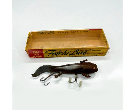 Adorable rubber life like lure with two treble hooks and a wobbly swimming tail. This item has its original box with clear li