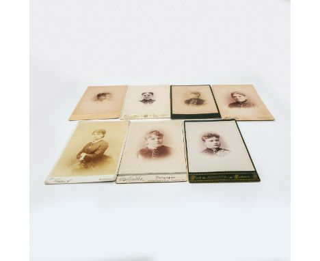 Featuring thick cardstock photographic material of women with relative likeness and similar attributes. Lovely portrait photo