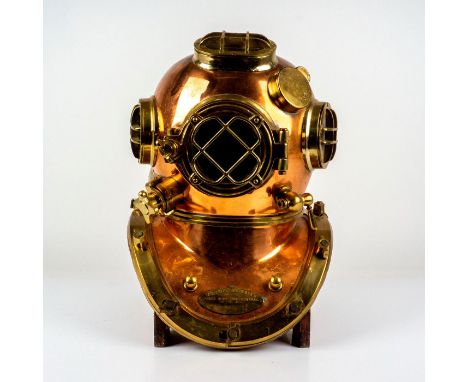Fantastic replica of metal diving helmet with polished copper and brass finish. Morse Diving Equipment Co. Inc. plaque to fro