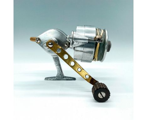 Extraordinary saltwater spinner, perhaps bench made or commercial prototype. Heavy gauge overbuilt aluminum, sculpture of a r