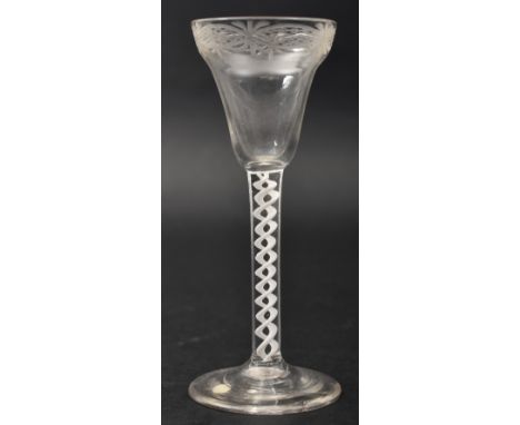 A George II mid 18th century circa 1755 crystal single series opaque twist etched wine glass. Etched pan top bowl, single ser