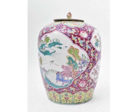 A large 19th century Chinese Oriental famille rose ceramic lidded urn vase. The vase having a short finial lid over an elonga