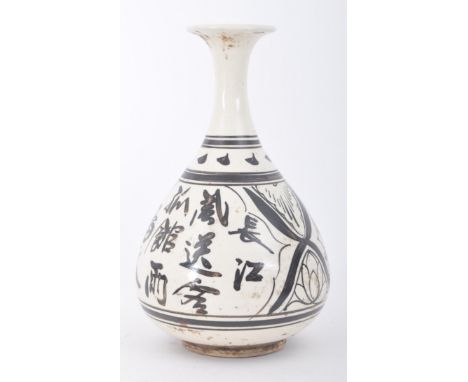 A 19th century Chinese Northern Song Dynasty manner Cizhou Kiln black &amp; white ceramic vase. The vase having a flared rim 