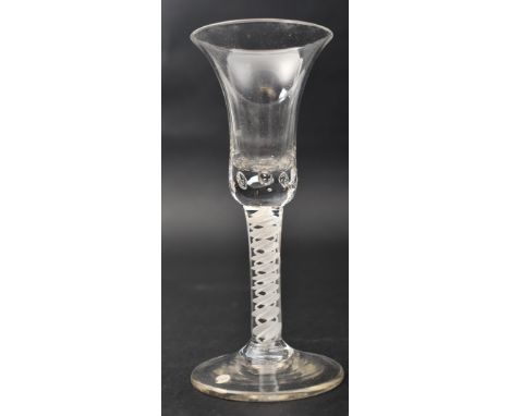 A George II 18th century circa 1740 crystal opaque double twist &amp; bubble control wine glass. Inverted flared bell shaped 