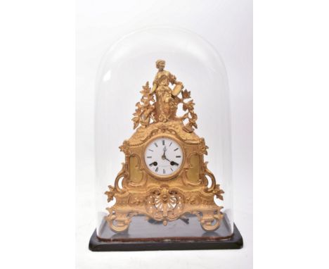 A 19th century French gilt ormolu mantle clock by Vincenti &amp; Cie. The mantel clock having a muse-like female figure atop 