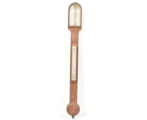 A George III 18th century M. Pillischer of London stick wall barometer. The barometer in oak case with hooded head over a str