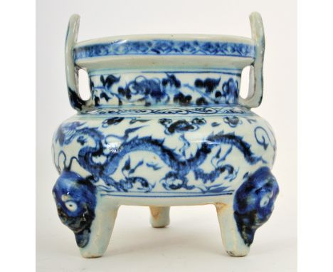A 19th century Chinese Qing Dynasty blue &amp; white ceramic tripod censor. The censor having twin slip handles to each sides