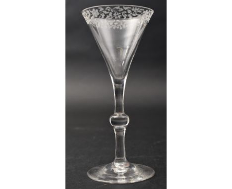 A George II 18th century 1760 crystal hand engraved balusteroid gin / cordial glass. Floral hand etched rim on conical bowl w