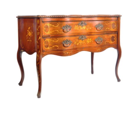 An 18th century Dutch Marquetry inlaid serpentine fronted commode chest of drawers. Raised on cabriole line inlaid legs with 