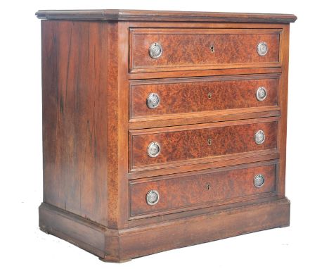 A George III 19th century burr walnut veneered bachelors chest of drawers / commode. The chest having a marquetry inlaid top 