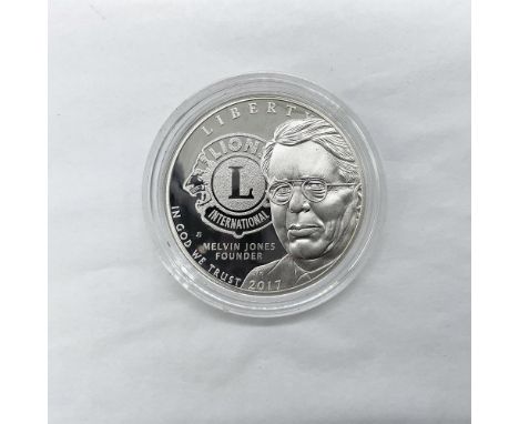 Philadelphia Mint. A commemorative issue Lions Club International Centennial coin. The obverse side depicts the portrait of f