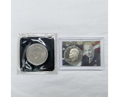 Collection includes 1971 US Eisenhower silver dollar coin with certificate of authenticity. The obverse side features a profi