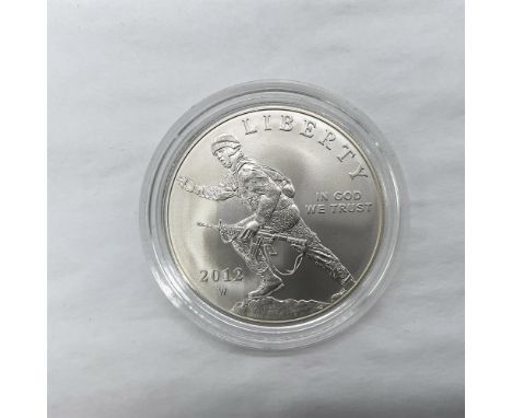 West Point Mint. The obverse side depicts a modern Infantry solider on a rocky ground. He is shown charging forward and becko