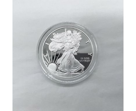 West Point Mint. The obverse side features full length of Liberty in stride. She is shown wrapped in the folds of the flag of