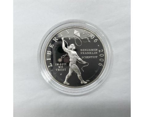 Philadelphia Mint. A coin that celebrates the tercentenary of the birth of Benjamin Franklin. The obverse side depicts Benjam