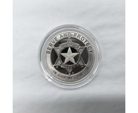 San Francisco Mint. Commemorative issue for the National Law Enforcement Memorial and Museum. A Proof Clad Half Dollar. The o