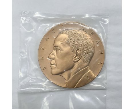 To commemorate the second term of 44th U.S. President, Barack Obama. The obverse side features a traditional profile of Presi