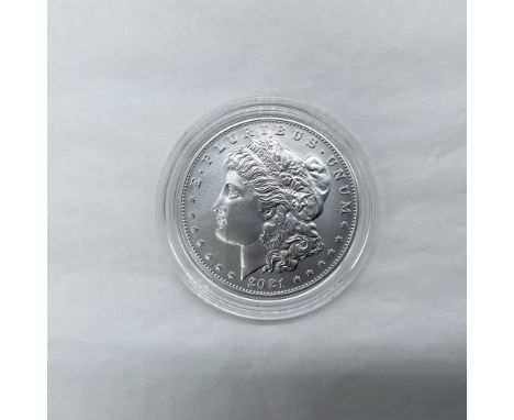 Philadelphia Mint. The obverse side features Liberty in profile. She is shown in cap, flora, and crown. The reverse side depi