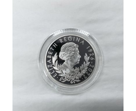 Honoring the life and service of former Queen of the United Kingdom, Elizabeth II (1926-2022). The obverse side features a pr