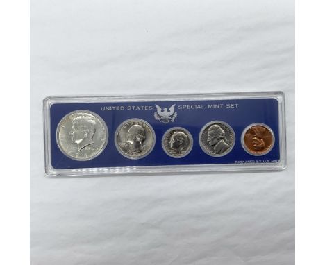Set includes a Half Dollar, a Quarter, a Dime, a Nickel, and a Penny. This item has its original box: 6.25"L x 2"W x 0.25"H. 