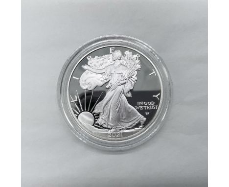 West Point Mint. The obverse side features full length of Liberty in stride. She is shown wrapped in the folds of the flag of