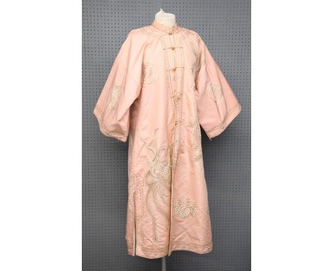 A Chinese pink robe embroidered with a peacock, Republic period. 125 cm longCondition Report:  The gown is in good condition 