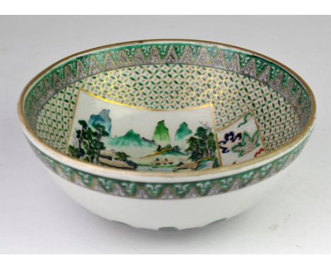 Chinese famille verte bowl, the centre decorated with a panel of figures in a landscape, mark to base, 24cm diameter,Conditio