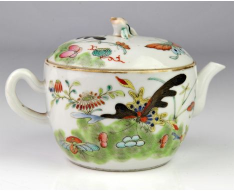 Chinese Republic period teapot and cover decorated with butterflies, mark to base overpainted, 10cm high,Condition Report:  L