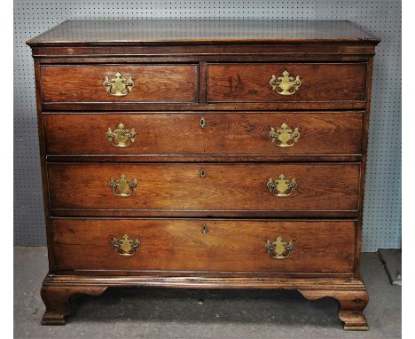 19th century oak chest of two short over three long graduated drawers with brass escutcheons raised on bracket supports