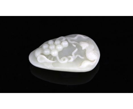 Chinese pale celadon jade relief carving of a mouse looking up at a bunch of grapes, 6cm high,