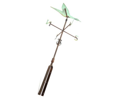 Early 20th century cast iron and copper weather vane, with a flying goose over four directional arms, H120cmCondition Report: