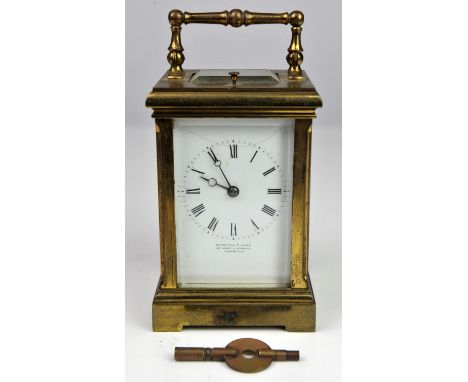 A brass repeating carriage clock, late 19th Century, retailed by Marshall and Sons, 87 George Street, London, Edinburgh, whit
