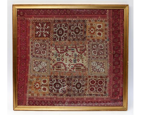 A Framed Uzbek Textile Panel , 19th century with repetitive patterns and  'Gul' motifs . 35'' X 32'' inch