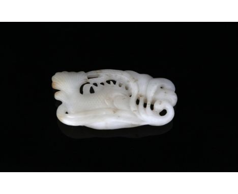 Chinese white jade carving of a fish under a lily pad, 8.5cm long,