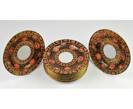 Twelve Ashworth Ironstone plates, 19th Century, decorated in the Imari palate, impressed marks to the base, 24cm diameter