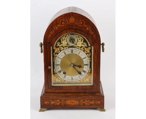 19th century rosewood cased and satinwood inlaid twin train barrel driven mantel clock, the silvered chapter ring with Roman 